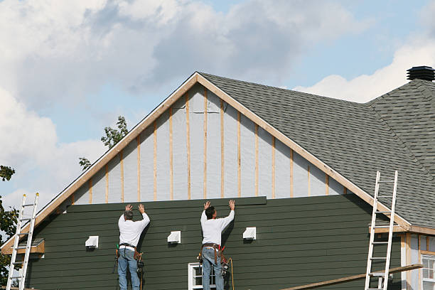 Professional Siding Installation technician working in Bausman, PA
